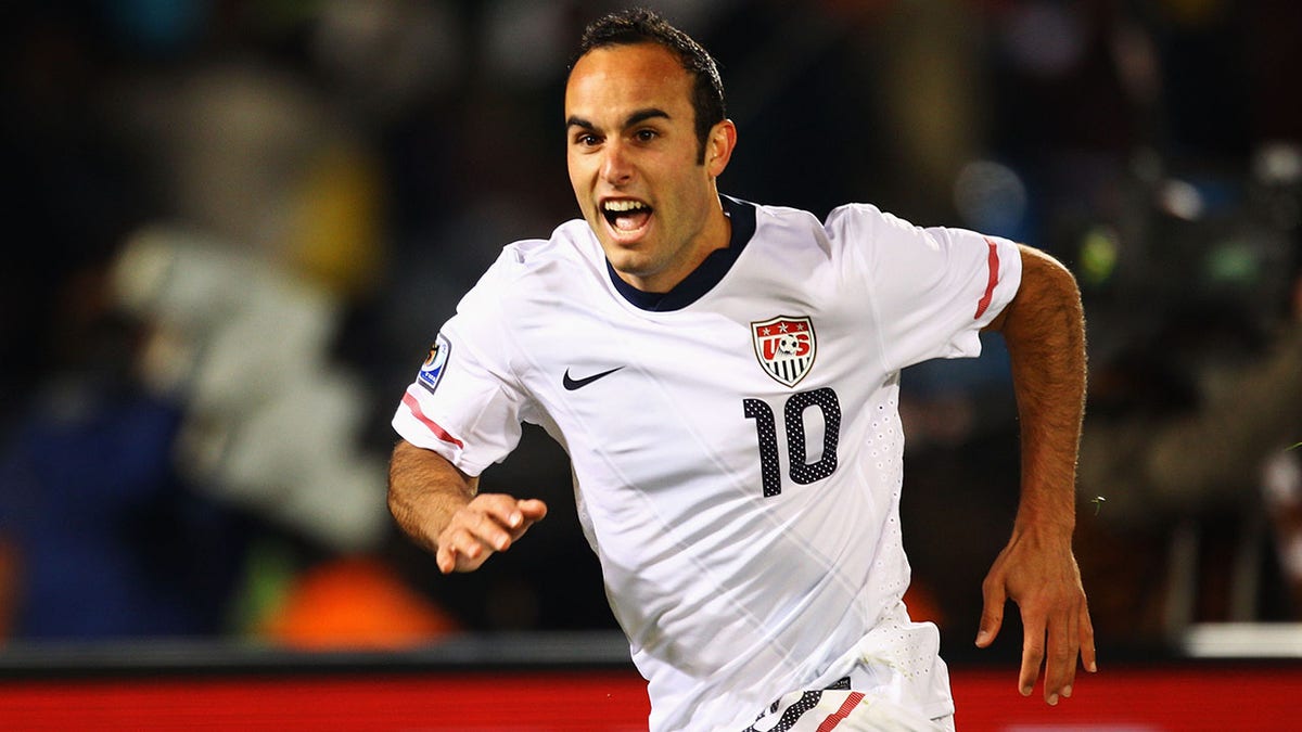 Landon Donovan celebrating after scoring a goal during a soccer match at Loftus Versfeld Stadium