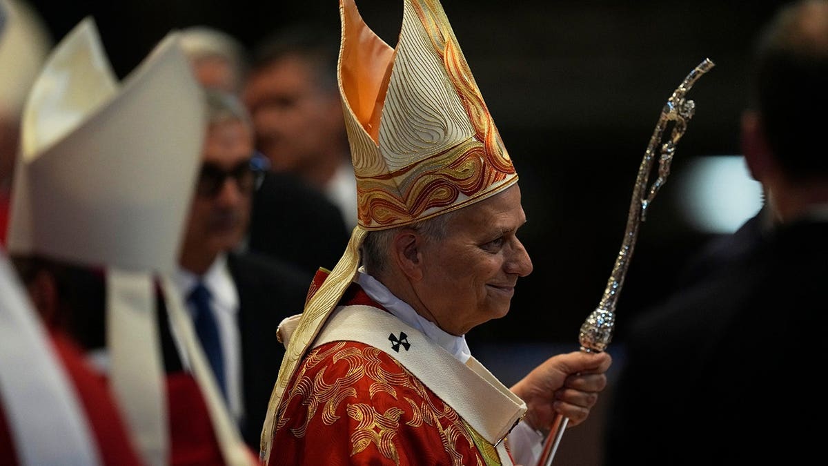Pope Leo XIV leaving Mass in full papal garb