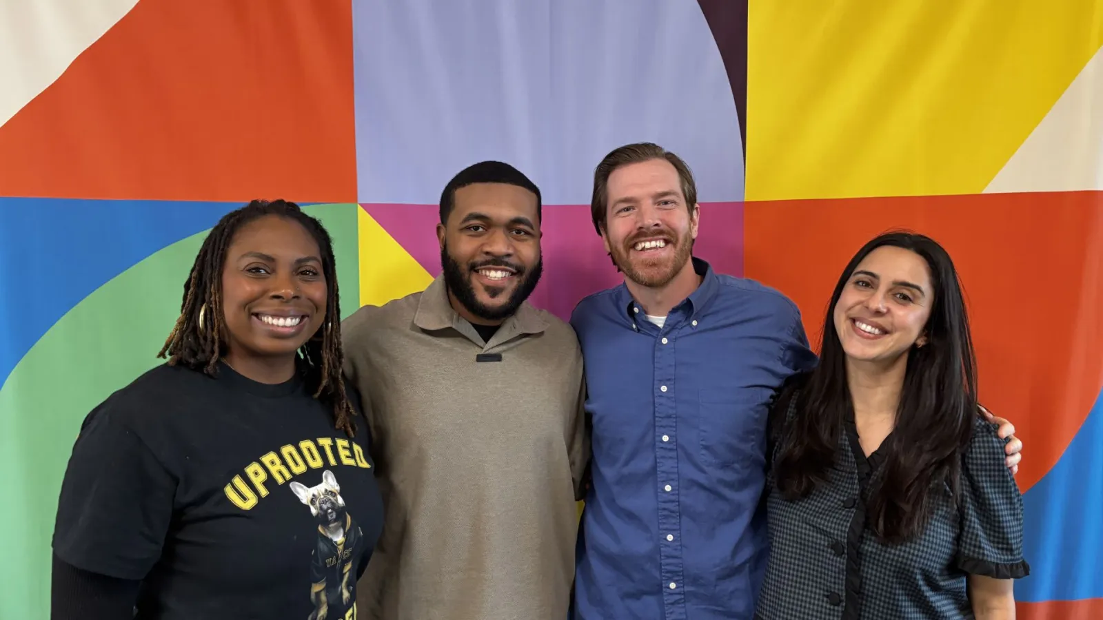 Jared Walker (middle right), founder of Dollar For, a non-profit organization aimed at helping patients terminate their medical debt, and supporters of the organization.