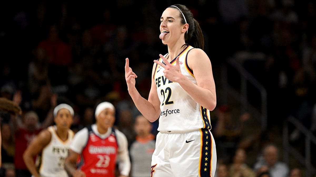 Indiana Fever guard Caitlin Clark shooting a three-point basket at CareFirst Arena