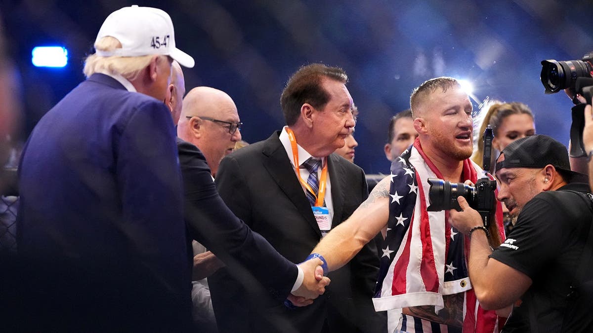 President Donald Trump stands on the ring with Justin Gaethje on the South Lawn of the White House