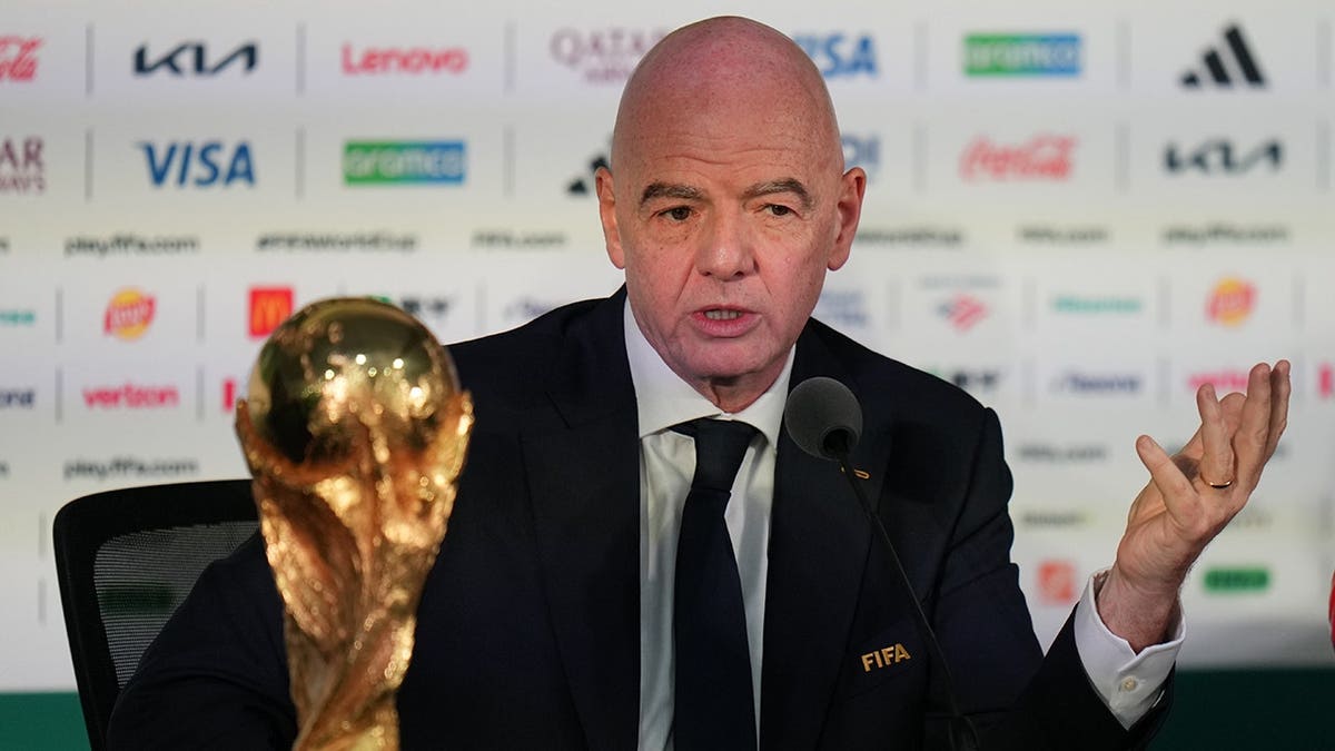 FIFA President Gianni Infantino speaking at a news conference in a stadium in Mexico City