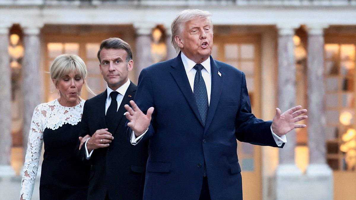 French President Emmanuel Macron and wife Brigitte Macron welcoming U.S. President Donald Trump at the Palace of Versailles