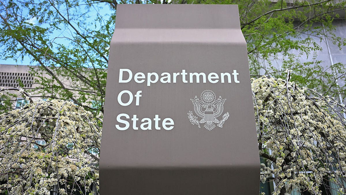 Signage for the US Department of State outside headquarters building in Washington DC