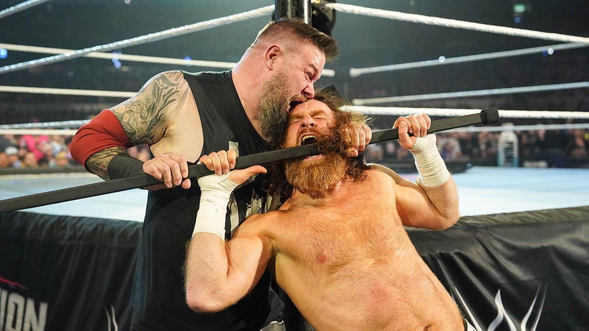 Kevin Owens wrestling Sami Zayn in WWE Elimination Chamber match at Rogers Centre Toronto