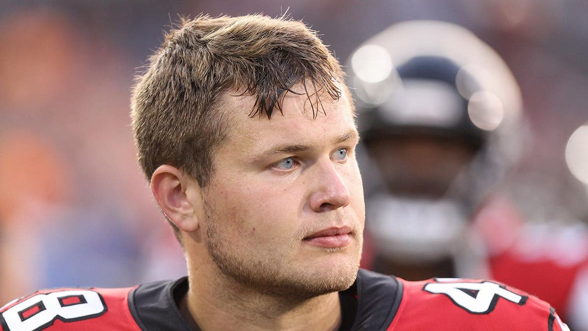 Atlanta Falcons long snapper Kyle Vasey looking on from the sideline during a football game