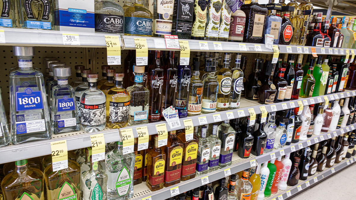 Liquor store shelves showing alcohol