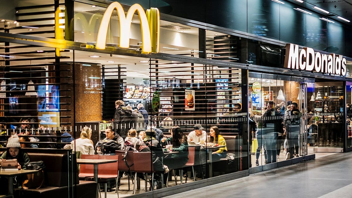 McDonald's and McCafe fast-food restaurant inside Berlin Hauptbahnhof train station.