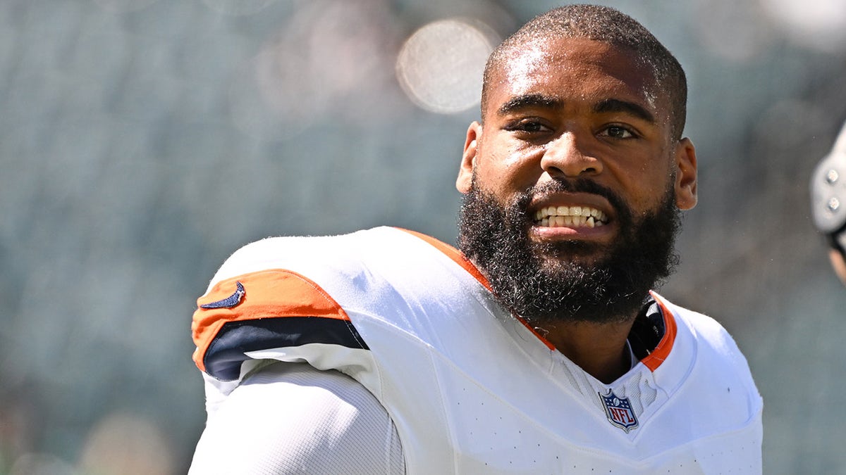 Denver Broncos linebacker Jonathon Cooper warming up on the field at Lincoln Financial Field.