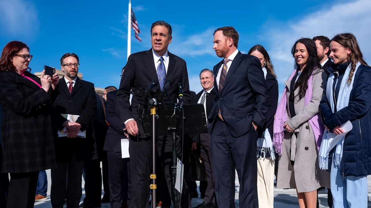 Raul Labrador and John McCuskey standing outside the US Supreme Court building in Washington, D.C.