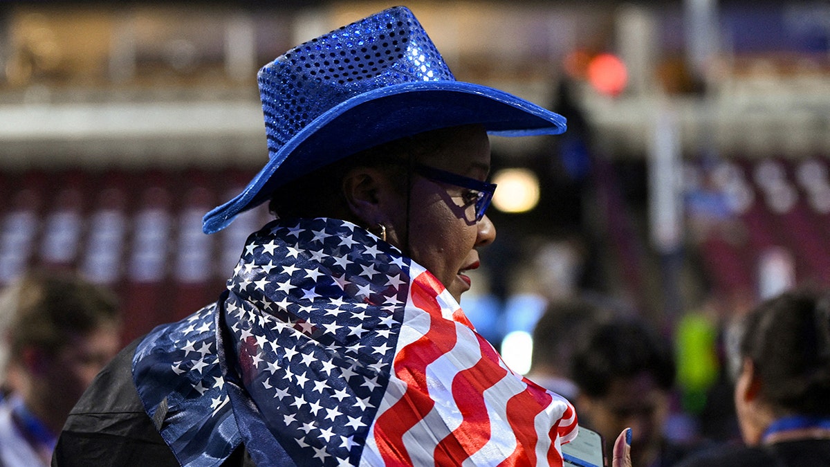 Regina Wallace-Jones wearing a U.S.-flag themed outfit