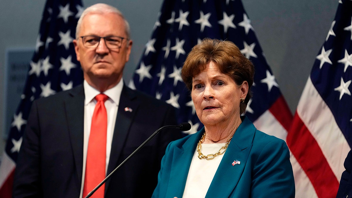 Senator Jeanne Shaheen speaking at a news conference in Ottawa with Senator Kevin Cramer listening