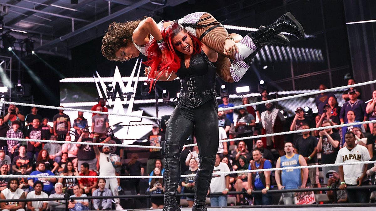 Zaria attacking Lizzy Rain during NXT match at WWE Performance Center in Orlando Florida