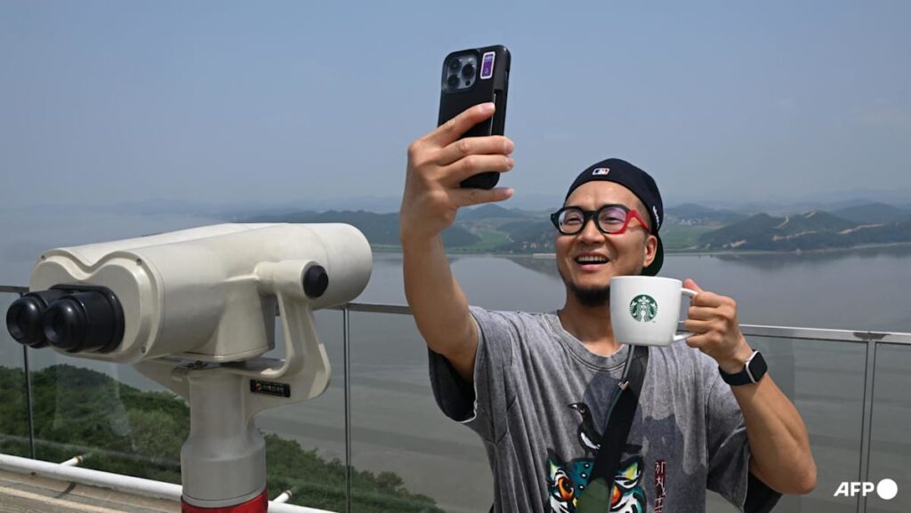 Coffee with a view: Tourists flock to Starbucks overlooking North Korea