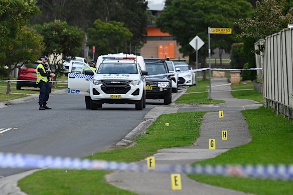 Evidence markers on the footpath at the scene in Glenmore Park.