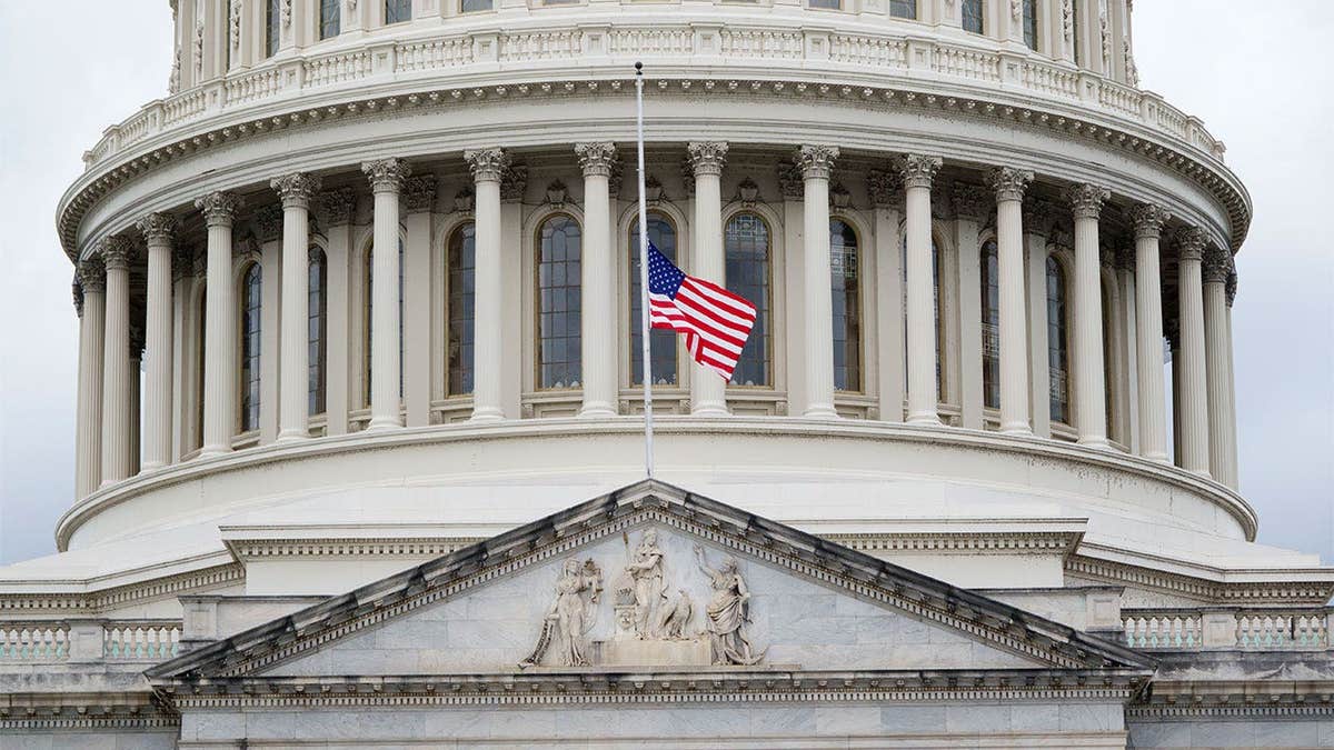 U.S. flag flying at half-staff above the Capitol after the death of Sen. Lindsey Graham