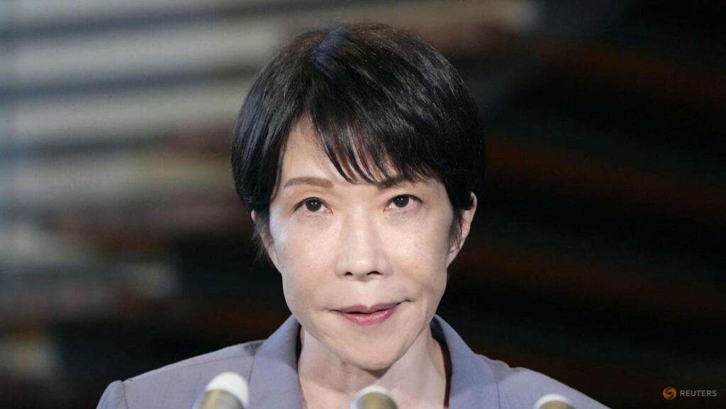 Japan PM vows to proceed with temporary cut in sales tax