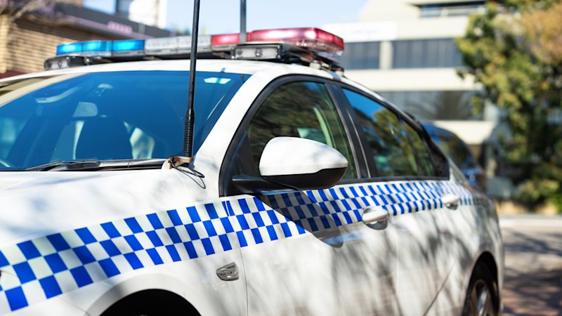 Man dies in car after cross-border pursuit Man dies in car after cross-border pursuit