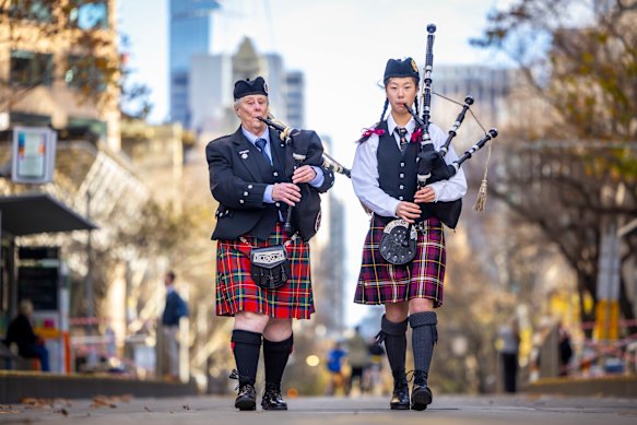 Helen Dilks and Scarlett Cai, 13, took part on Sunday in the world record attempt for the largest female bagpipe performance. 