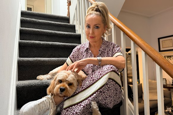 Even Scout the dog is missing the tree (pictured here with her owner, Melissa Hoyer).