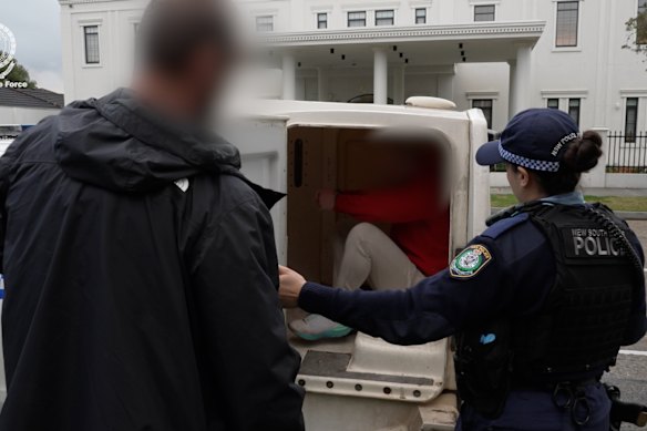 A man is taken into custody at Bexley by officers connected to Strike Force Harskamp.