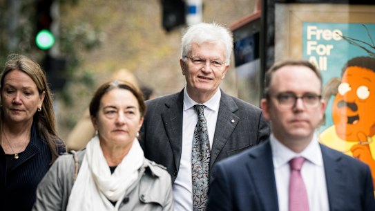 Professor Glyn Davis (centre), interim vice-chancellor of the University of Melbourne, arrives for the hearing of the Royal Commission on Antisemitism and Social Cohesion.