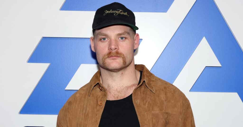 Travis Kelce’s Friend Beau Allen Looks Dapper in Tan Tux Ahead of Wedding: ‘Not a Lot Going On’