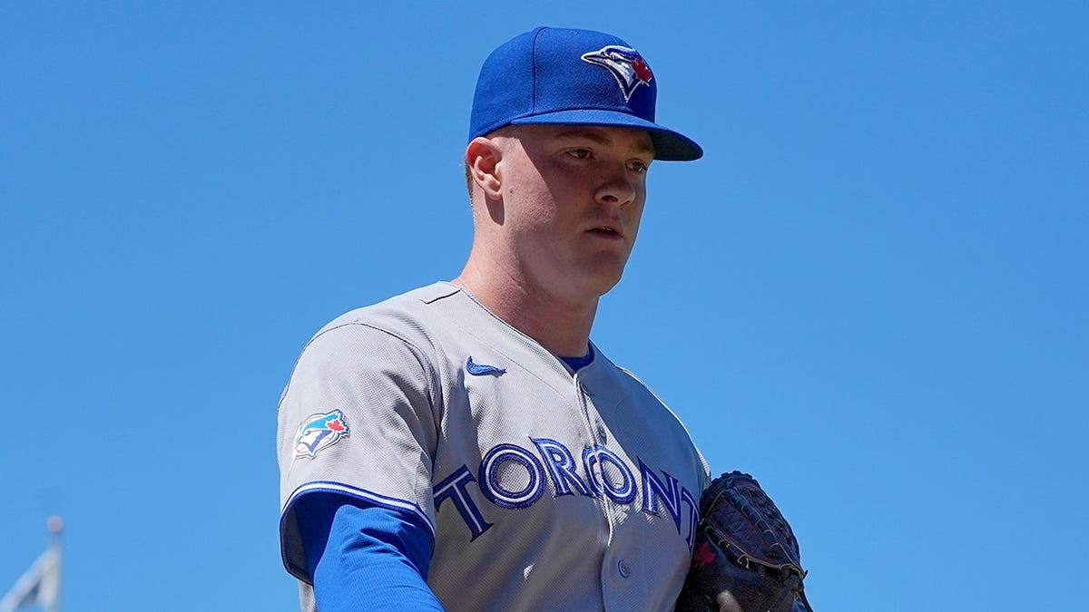 Braydon Fisher leaves the field at Wrigley Field.