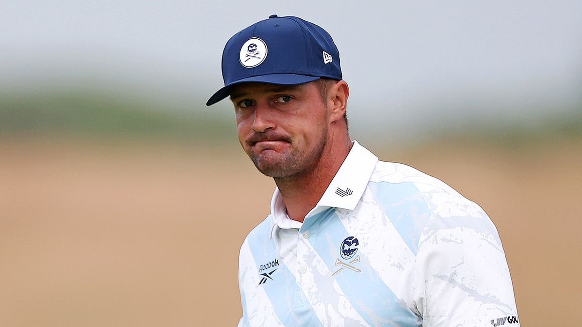 Bryson DeChambeau reacts on the 13th green.