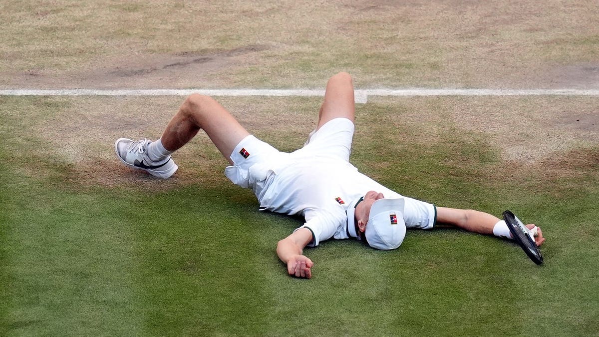 Jannik Sinner celebrates on the court after the Gentlemen's Singles Final at Wimbledon.