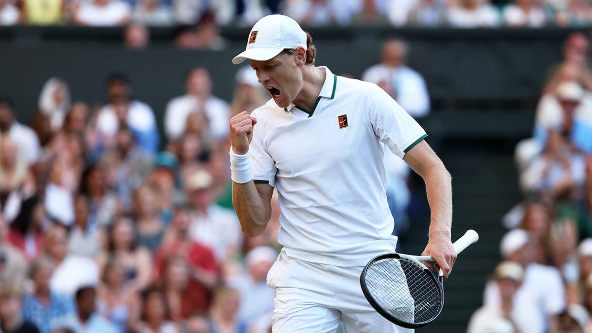 Jannik Sinner celebrates a point during the Wimbledon final in London.