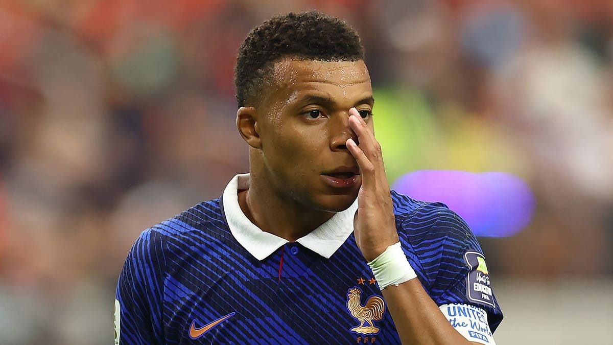 Kylian Mbappe reacts during the match at Dallas Stadium.