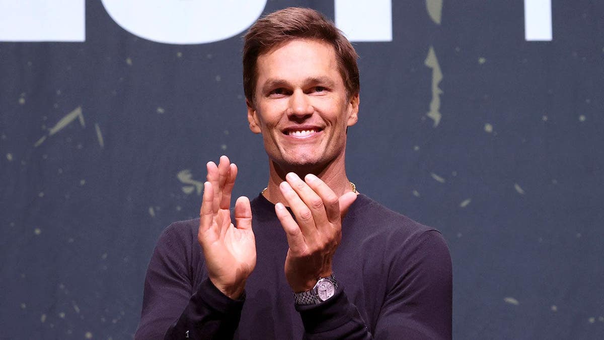 Tom Brady speaks onstage at a panel at Fanatics Fest NYC.