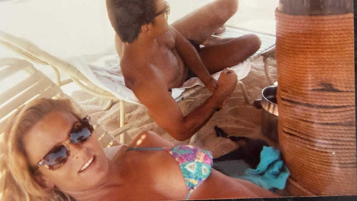 Nicole Brown Simpson and Joseph Perrulli spending time together at the beach.