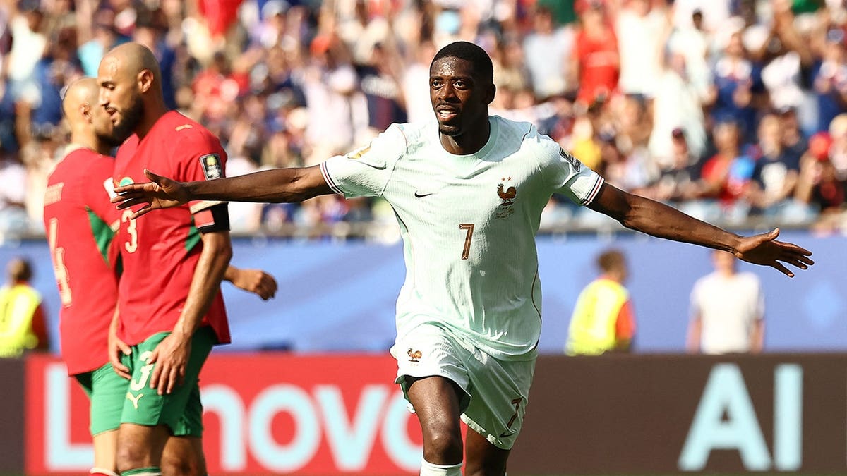 Ousmane Dembele celebrates goal