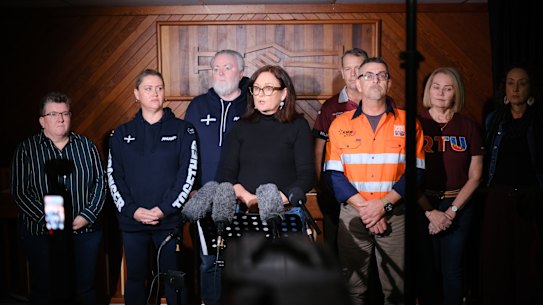 Queensland Council of Unions general secretary Jacqueline King (centre) at a media conference with other union officials to draw a “line in the sand” on the Crisafulli LNP’s “ideological” attacks on workers’ rights.