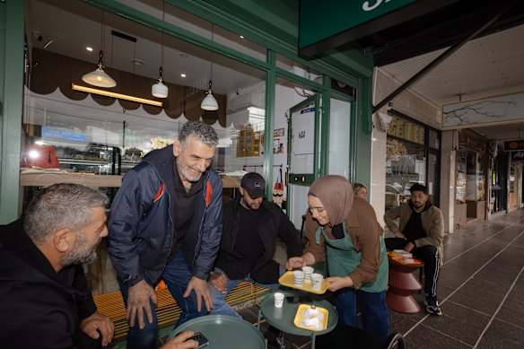 Smeed Cafe owner Serena Tajjour with customers at the Belmore cafe.