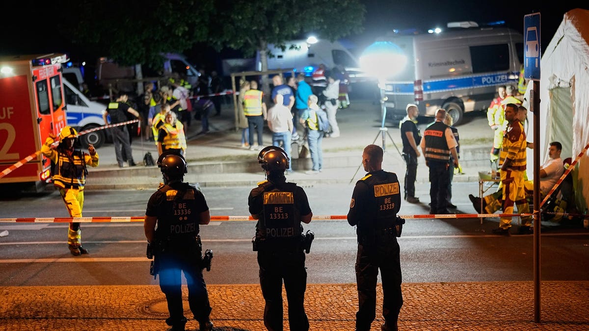 Emergency personnel and police gather in Berlin following Christopher Street Day cancellation.