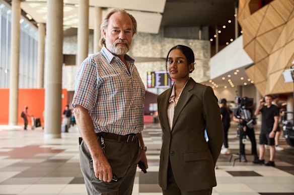 Hugo Weaving and Shabana Azeez star in The Aiport Chaplain on SBS.
