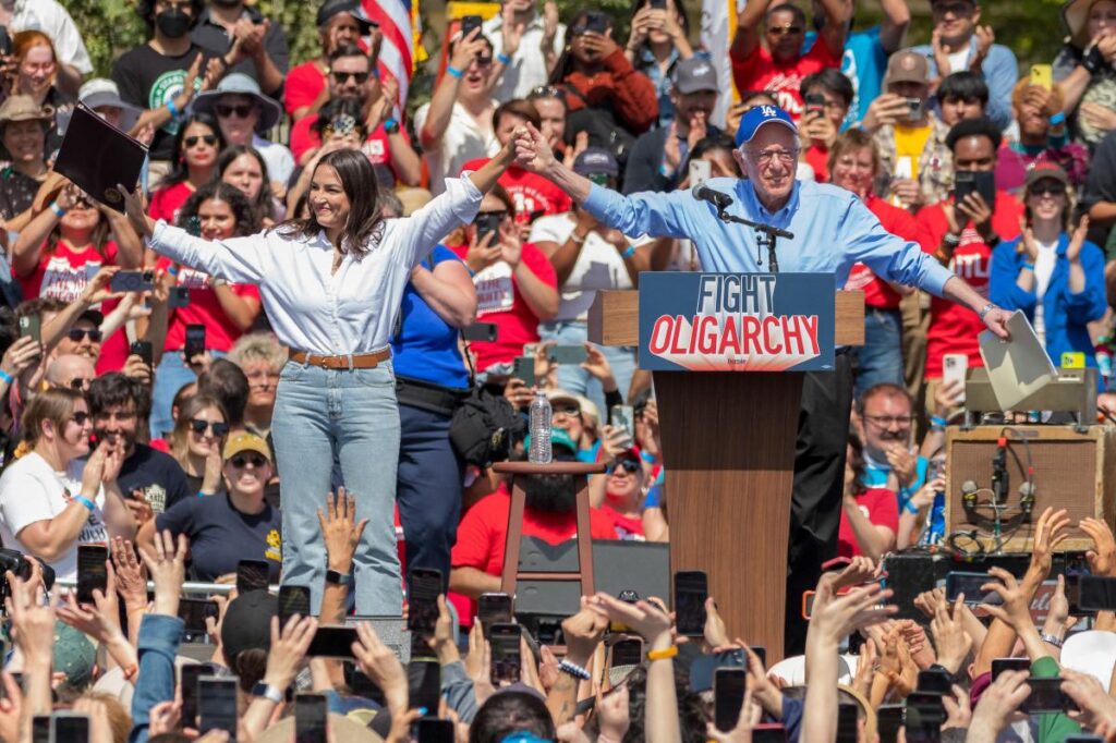 AOC heads to battleground Michigan to boost left wing candidate – and herself