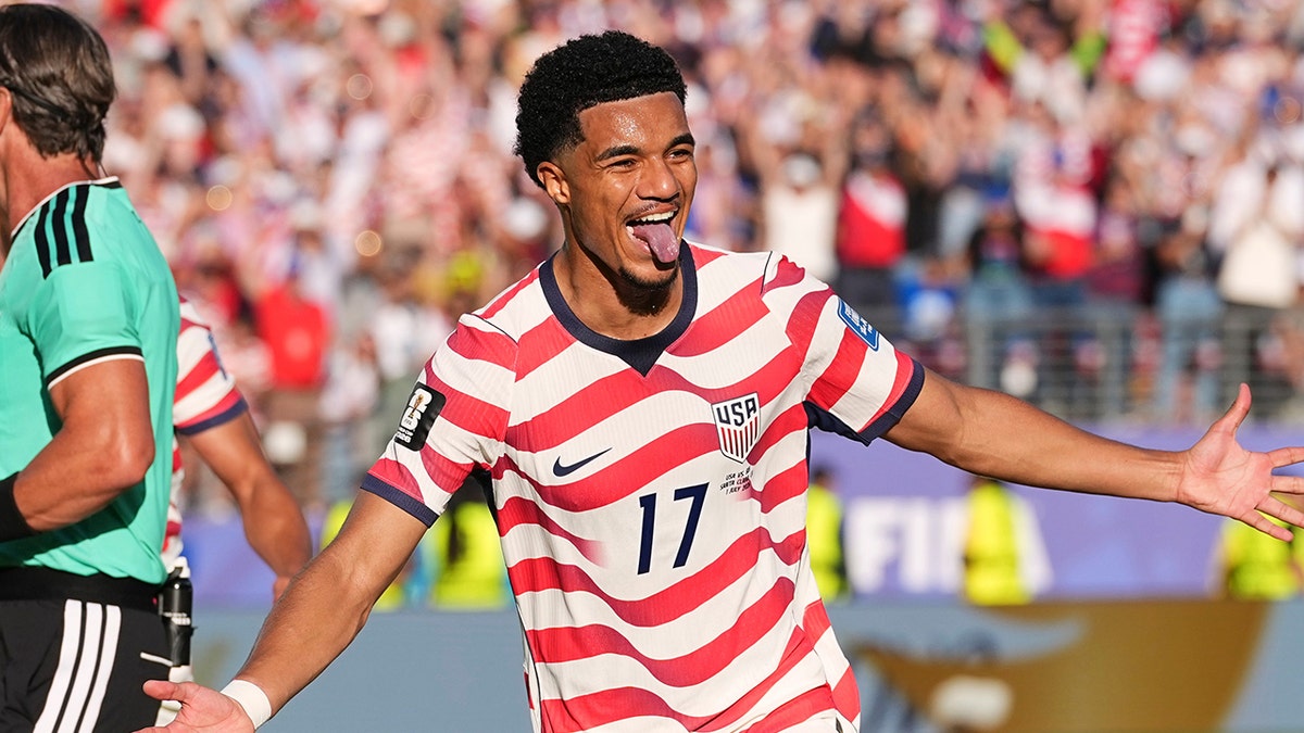 Malik Tillman celebrates goal