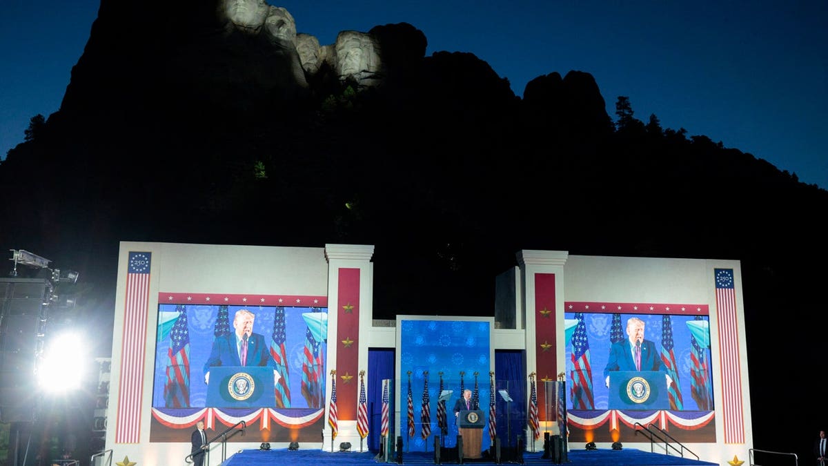 President Donald Trump speaks beneath Mount Rushmore
