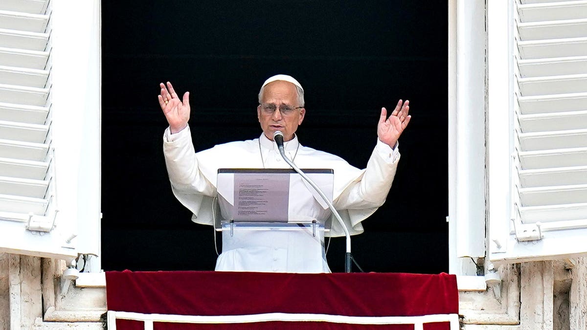 Pope Leo XIV waves from balcony