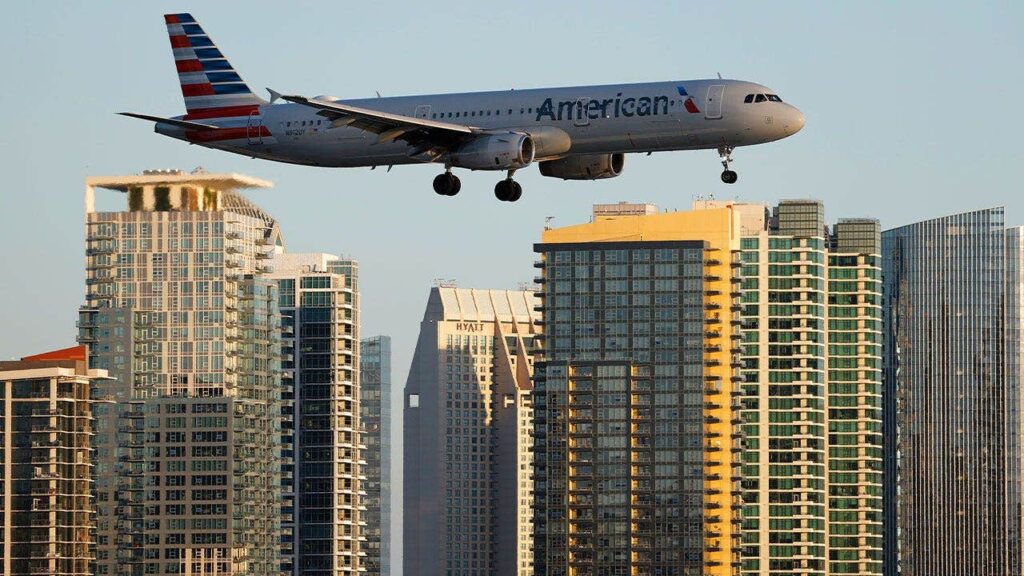 American Airlines flight lands safely after laptop battery catches fire on board; passenger injured American Airlines flight lands safely after laptop battery catches fire on board; passenger injured