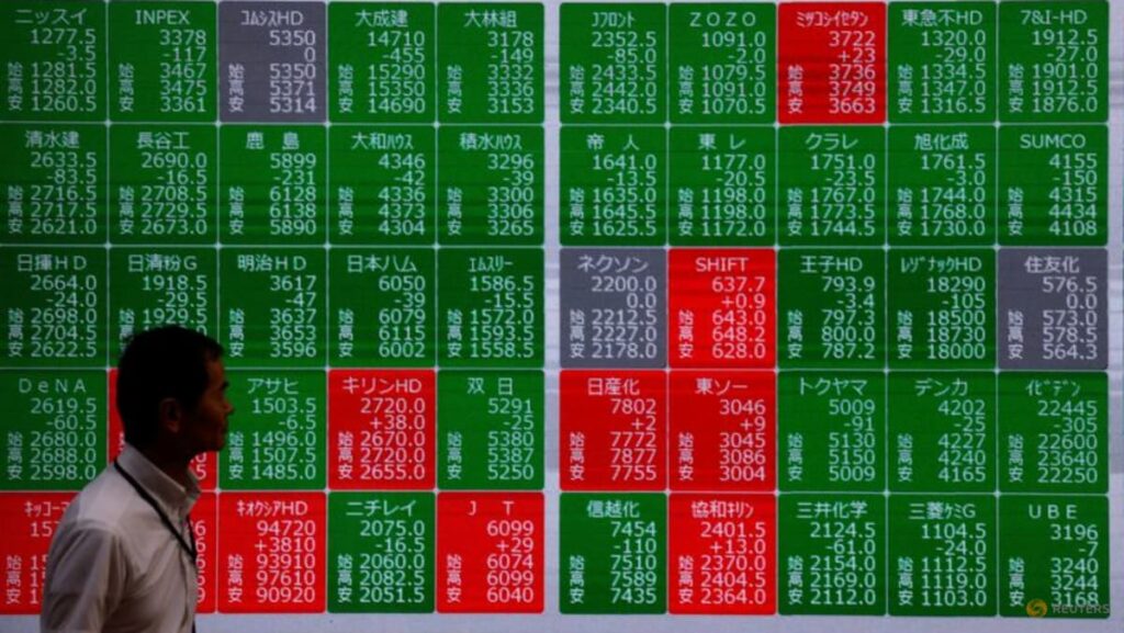 Asian stocks mostly down with tech firms back under pressure