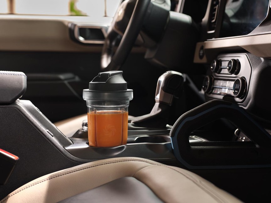 The Vitamix Nano cup in a car cup holder.