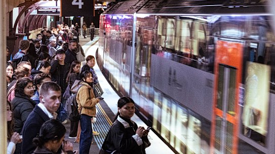 Commuters at Redfern station on Friday afternoon.
