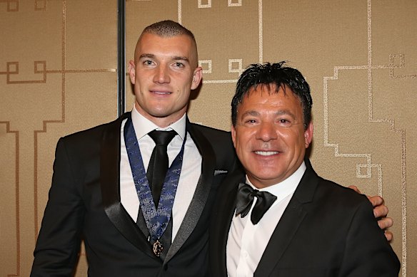 Dustin Martin poses with Carr, then the footballer’s manager, after winning the 2017 Brownlow Medal.