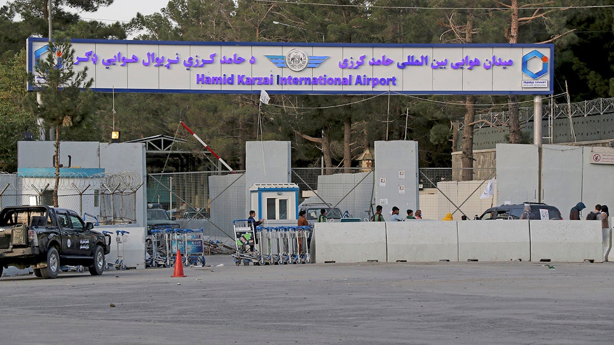 General view of the gate of Hamid Karzai international Airport in Kabul, Afghanistan, Saturday, Aug. 28, 2021. The Taliban have sealed off Kabul’s airport to most would-be evacuees to prevent large crowds from gathering after this week's deadly suicide attack. The massive U.S.-led airlift was winding down Saturday ahead of a U.S. deadline to withdraw from Afghanistan by Tuesday.
