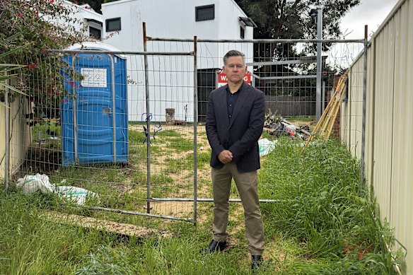 WA Greens leader Brad Pettitt at one of the half finished social homes in Hilton.